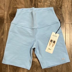 Alo Biker shorts in blue skies